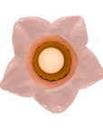 underside of a pink and chartreuse floral pendant light on a white background